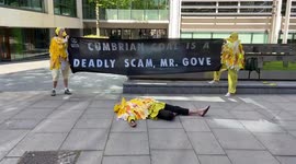 Extinction Rebellion ‘dead canaries’ outside the Home Office in protest against the Cumbrian coal mine