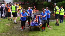 Exhausted teams carry beds across river in final push of Bed Race in Yorkshire