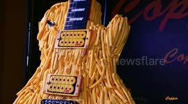 Artist makes guitar from french fries