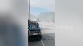 Motorist crashes as ash haze from Philippines volcano reduces road visibility