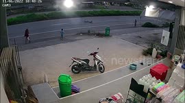 Toddler rides bike into road narrowly missing oncoming car