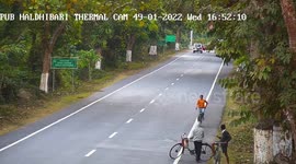 Moment cyclist survives sudden leopard attack on road in eastern India