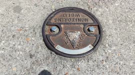 Pareidolia in Paris. Manhole, sewer. Pont des Invalides. France, 2022