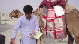 Man sets up library on camel's back to educate kids in remove Pakistani villages
