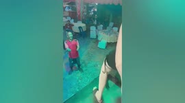 Pensioner enjoys sexy 'coyote girl' twerking onstage at wedding