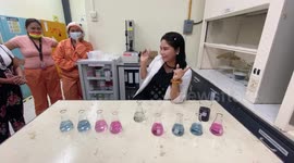 Pregnant chemist mixes chemicals to make coloured liquid for gender reveal party