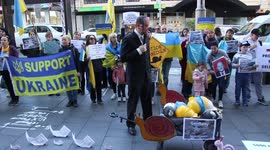 Ukrainians and other supporters protest in front of the German Consulate in Sydney to demand more military support for Ukraine in its battle against the Russian invasion
