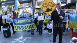 Ukrainians and other supporters protest in front of the German Consulate in Sydney to demand more military support for Ukraine in its battle against the Russian invasion