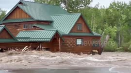 Footage shows floodwaters ripping through homes in Red Lodge, Montana