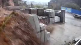 Massive landslide caused by heavy rain buries stone factory in southern China