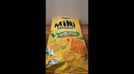 Cheese string coated in a crispy cheesy crumb