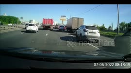 The owner of the car rammed the dump truck in retaliation for the driver who threatened him