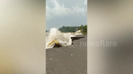 Homes swept into sea as coastal erosion causes ground to collapse in Indonesia