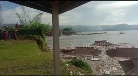Atmosphere After Abrasion on the Amurang Coast, Minahasa, North Sulawesi 15 Houses and Bridges Collapsed