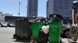 Paris dustmen strike during that huge heat wave creates bad smells and causes troubles for the wheelchairs on the sidewalk. 16 june 2022.