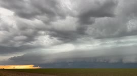 Glowing structured shelf cloud forms in Eastern Colorado