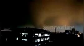 Sparks illuminate tornado as it tears through train station in southern China