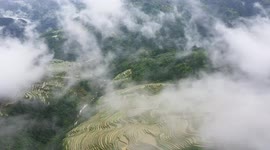 Aerial Footage Of Clouds And Mist Surround Jiapang Rice Terraces