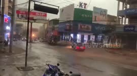 Strong gusts tear apart billboards and posters during storm in Myanmar