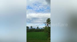 Terrified villagers watch as tornado destroys dozens of homes in Indonesia