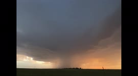 Slo mo purple lightning bolt crawls through updraft of supercell in Keenesburg, Colo.