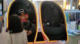 Exciting Kids playing VR Game in a children toys shop in Malacca Malaysia