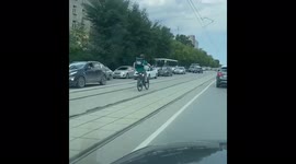 Dancing Russian delivery rider survives nasty collision