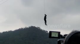 Longer Version_Tourists left stranded mid-air after cable car gets stuck in northern India