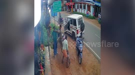 Brave Indian police officer tackles man armed with machete