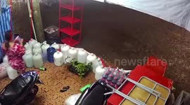 Playful lads enjoy splashing flood but scrambles when lightning stuck