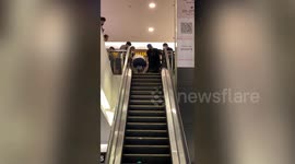 Toddler rescued after getting feet stuck in escalator in Malaysia
