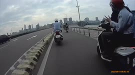 WTF Moment: Moped's wing mirror comes flying off after speedbump (Dashcam Video)