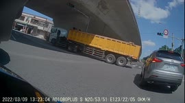 WTF Moment: Truck driver drives into curb and traffic light (Dashcam Video)