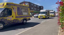Convoy of vans take part in a funeral procession for much-loved ice cream man