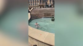 Baking Brumies take a dip in city centre fountain as temperatures soar