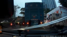 WTF Moment: Metal pipes in back of trucks cab collide with a truck (Dashcam Video)