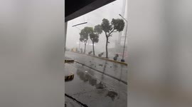 Violent storm rips through Philippines capital Manila forcing motorists to take shelter