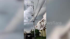 Funnel cloud sparks panic after lingering in sky for almost an hour in the Philippines