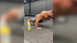 A mechanic has smashed the world record for most push-ups in an hour - completing a staggering 3,183
