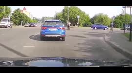 A man on an electric scooter fell into a hole in the road and rolled over
