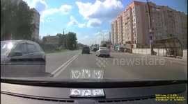 Car overturned after being hit by a minibus