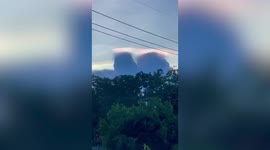 Beautiful cloud iridescence lights up sky in Thailand