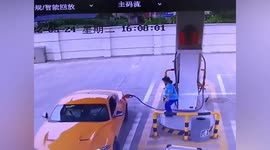 Gas station employee sent flying as car leaves with pump still attached in China
