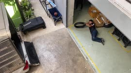 'Lazy but smart' worker gets the job done while lying on the floor