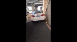 WTF Moment: Toyota driver almost gets stuck when driving down the bike lane (Dashcam Video)