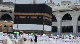 Muslim pilgrims perform Friday prayer around the Kaaba, Islam's holiest shrine, at the Grand mosque in the Saudi city of Mecca, during annual Hajj pilgrimage
