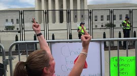 Angry pro-abortion rights activists flip off Supreme Court building in DC