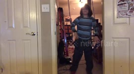 Boy Falls from Doorway Swing