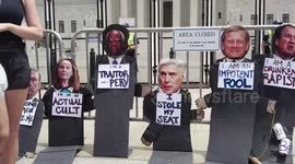Protesters in Washington, DC mock Supreme Court Justices who overturned Roe v Wade