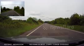 Professional HGV driver overtakes tractor on a bend with double lines and a filter right lane
